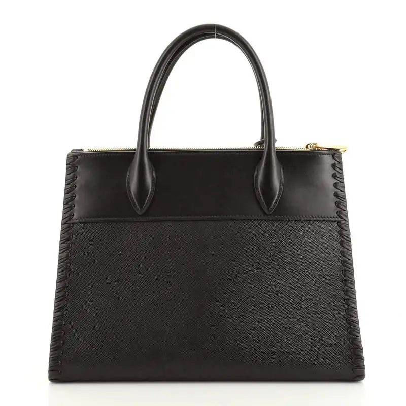 Prada paradigme bag price 2025